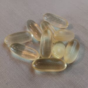 Kapsułki softgel z olejem algowym DHA na lnianej tkaninie